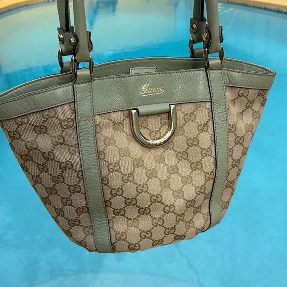 Gucci Handbags - Gucci GG Monogram Fabric Cream and Mint Green Leather Bucket Style Shoulder Bag